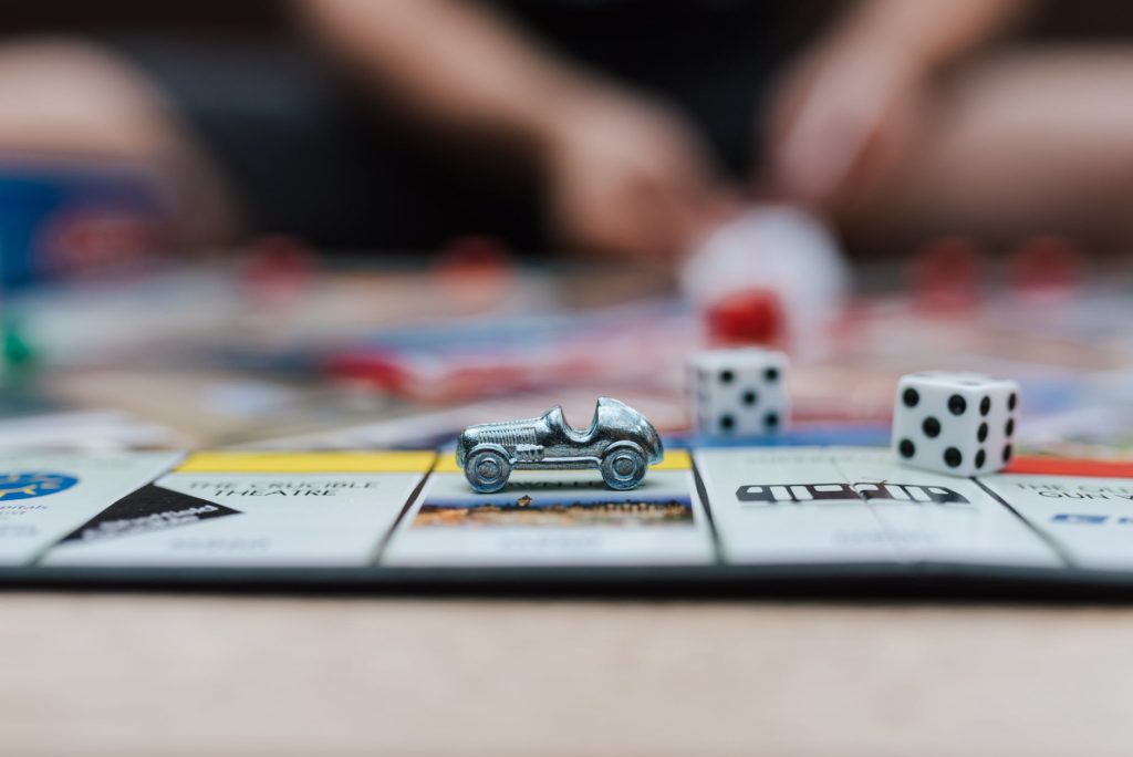 decorative automobile on game board on table