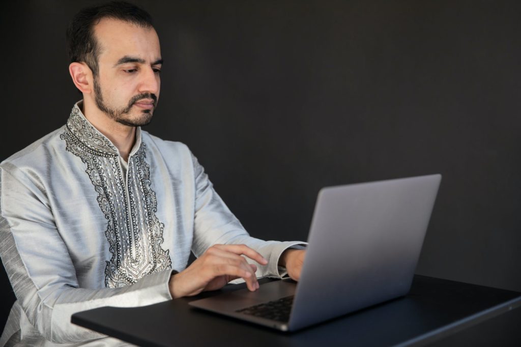 man using a laptop