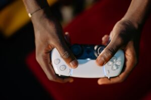 a person holding a game controller