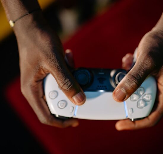 a person holding a game controller