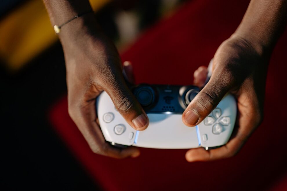 a person holding a game controller